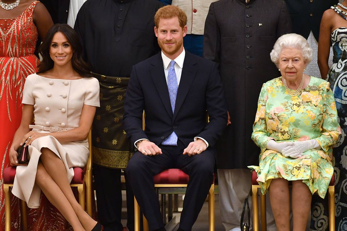 Meghan Markle, príncipe Harry e rainha Elizabeth II