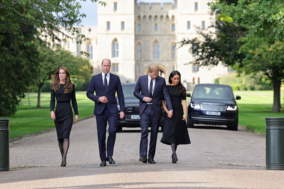 WINDSOR, ENGLAND - SEPTEMBER 10: Catherine, Princess of Wales, Prince William, Prince of Wales, Prince Harry, Duke of Sussex, and Meghan, Duchess of Sussex on the long Walk at Windsor Castle on September 10, 2022 in Windsor, England. Crowds have gathered and tributes left at the gates of Windsor Castle to Queen Elizabeth II, who died at Balmoral Castle on 8 September, 2022. (Photo by Chris Jackson - WPA Pool/Getty Images)