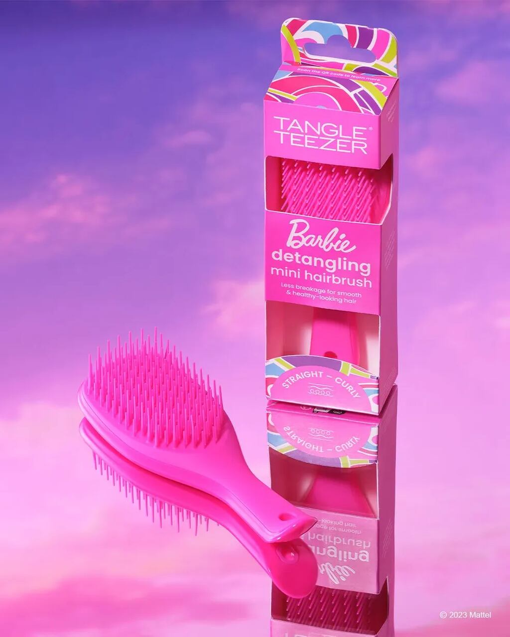 Na foto, uma embalagem de escova de cabelo com uma escova rosa - Metrópoles